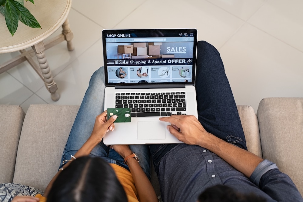 couple doing shopping online with credit card